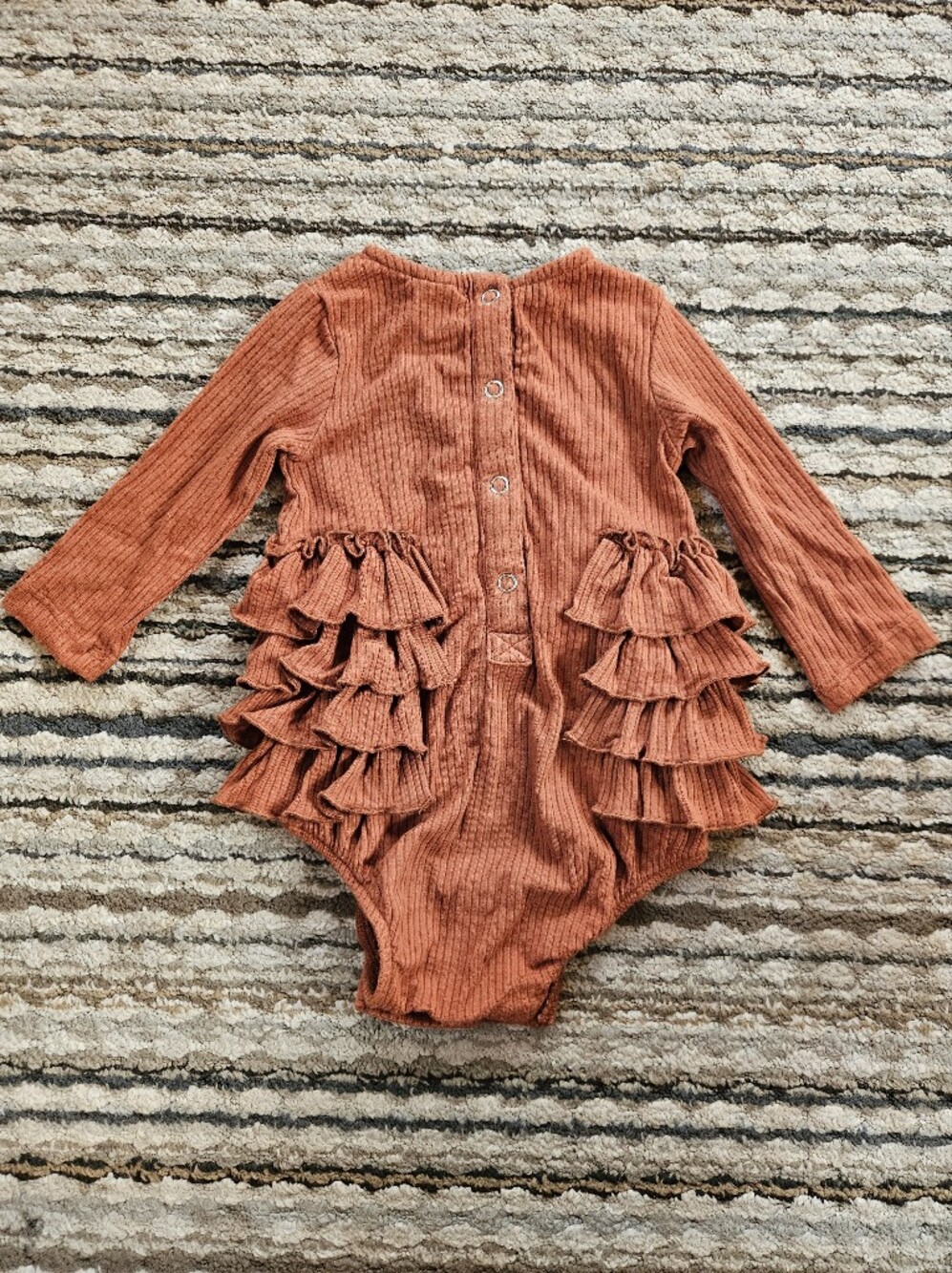 kate quinn Rust Ruffle Ribbed One-Piece Bodysuit - Picture 2 of 3